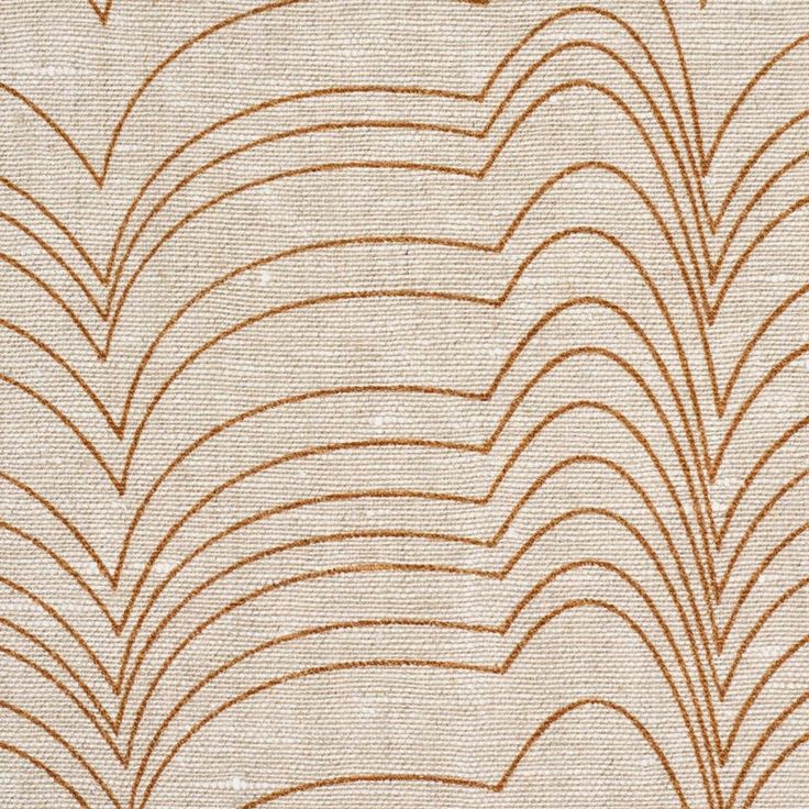 an orange and beige fabric with wavy lines