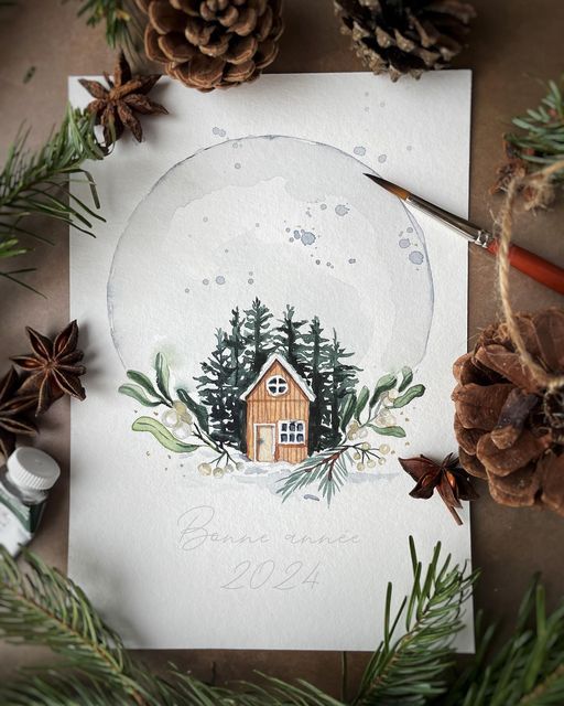 a paper with a house on it surrounded by pine cones