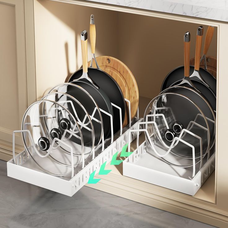 two pots and pans are sitting in the dishwasher's trays