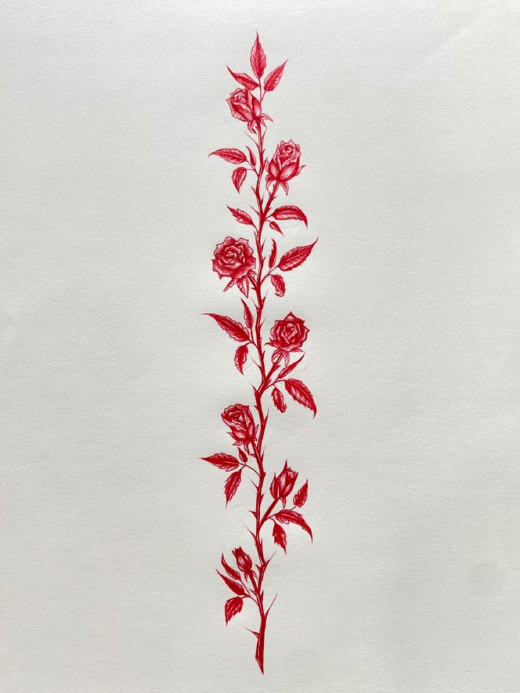 a drawing of red flowers on white paper