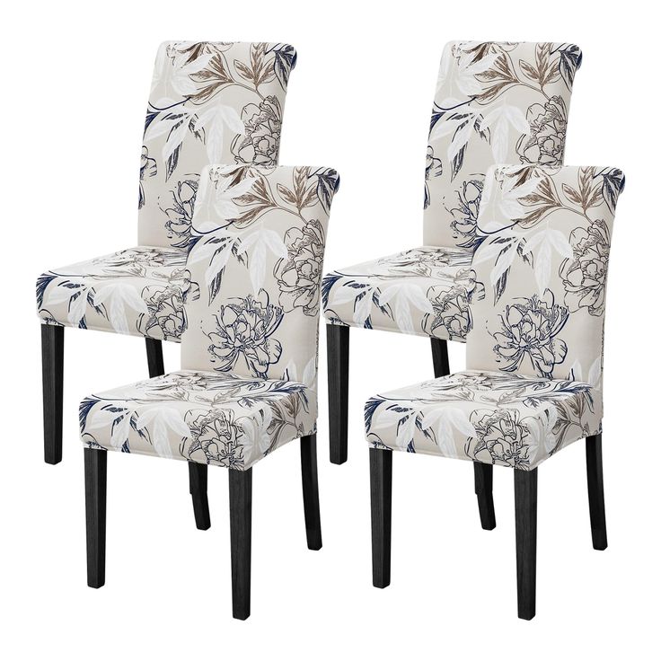 two chairs with floral fabric upholstered on them