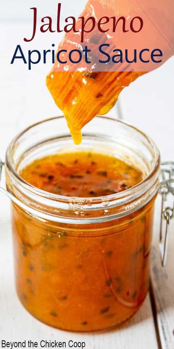 a jar filled with jalapeno apricot sauce