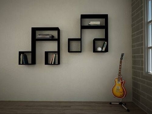 there is a guitar and some shelves on the wall