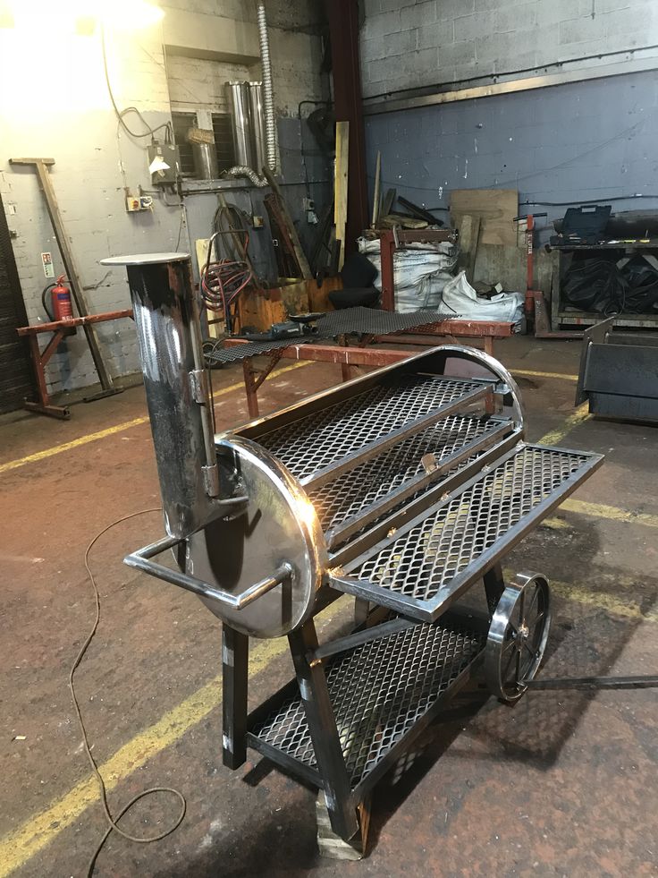 a metal cart sitting inside of a warehouse