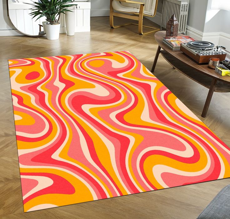 a living room with a rug on the floor