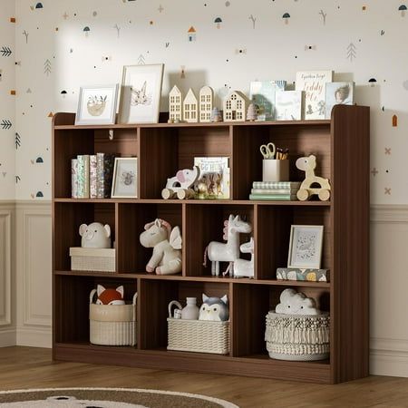 a bookshelf filled with lots of toys in a child's room