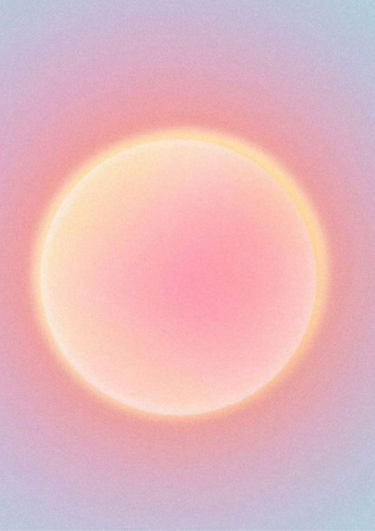 an orange and pink circle on a white background