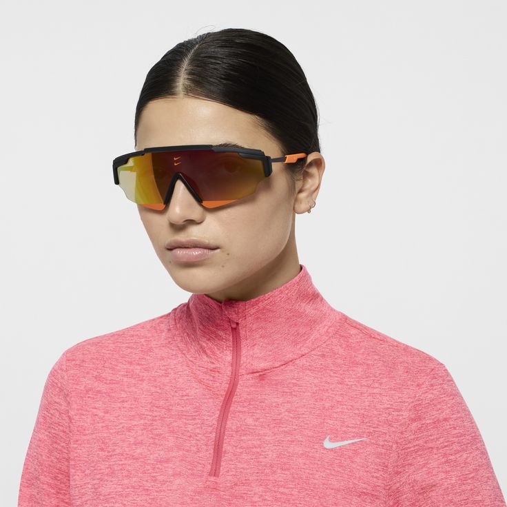 Reimagining sport shields for every day, the Nike Marquee Edge sunglasses offer panoramic views in an ultralight frame. The angular design accommodates a wide lens and has rubberized zones at the top bar, nose pad and temples to give you a grippy, stay-put fit while adding unexpected pops of bold color. Functional Shield Sunglasses With Uv Protection For Outdoor, Sporty Shield Sunglasses For Outdoor Activities, Functional Sunglasses With Uv Protection For Cycling, Functional Cycling Sunglasses With Uv Protection, Functional Uv Protection Sunglasses For Cycling, Functional Shield Sunglasses With Uva Protection For Outdoor Activities, Sporty Shield Sunglasses With Uv Protection For Sports, Sporty Shield Sunglasses With Uv Protection, Sporty Anti-reflective Shield Sunglasses