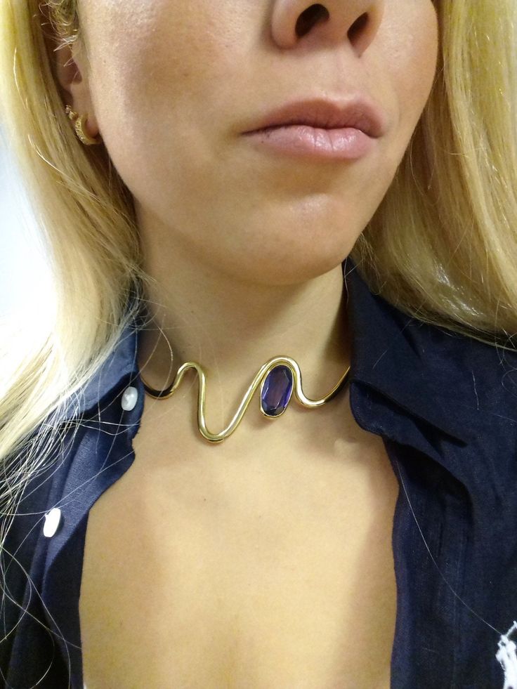 Dear All, Please note that we partnered with FedEx Couriers for all orders from USA. Therefore, when ordering please inform us at NOTES section or via email a valid contact number and email address. Beautiful handmade jewelry - piece of art - one of a kind Model : Aegean - Gold Wavy necklace with precious stone amethyst or plain metal BRASS/ gold-plated Handmade Adjustable size - open from behind for your convenience This item's measurements are (Approximately): Width 13.7 cm / 5.4 in Width of O Gold Jeweled Choker, Gold Gemstone Choker, Adjustable Gold Jeweled Choker, Adjustable Gold Choker With Gemstone, Adjustable Gold Gemstone Choker, Adjustable Gold Choker With Jewels, Gold Amethyst Jewelry For Party, Party Jewelry In Gold With Amethyst, Elegant Gold Gemstone Choker