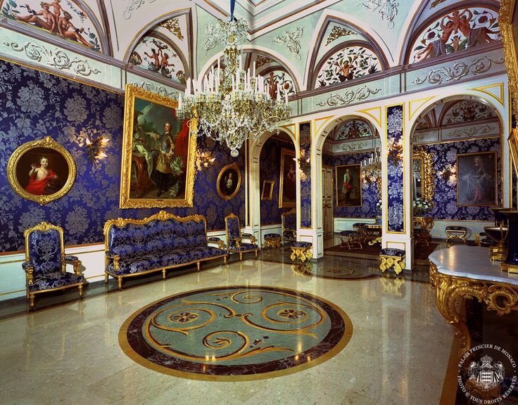 an ornately decorated room with blue and gold walls