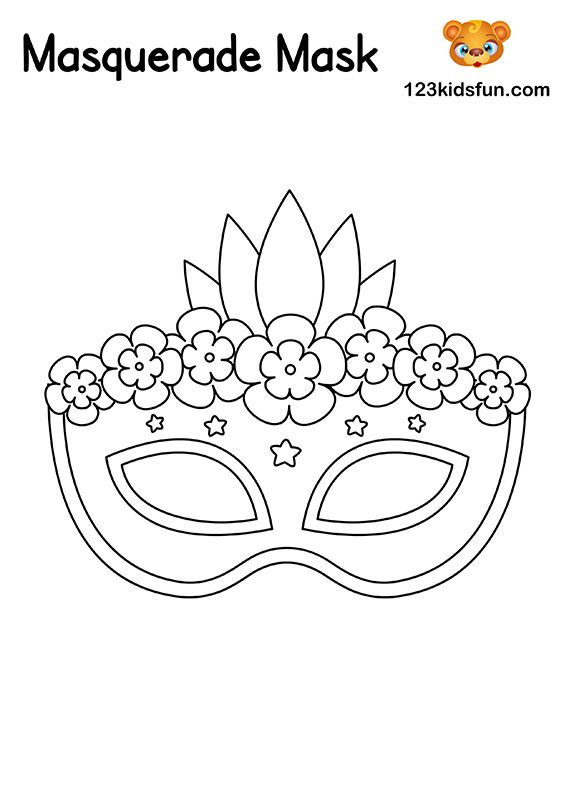 a masquerade mask with flowers and leaves