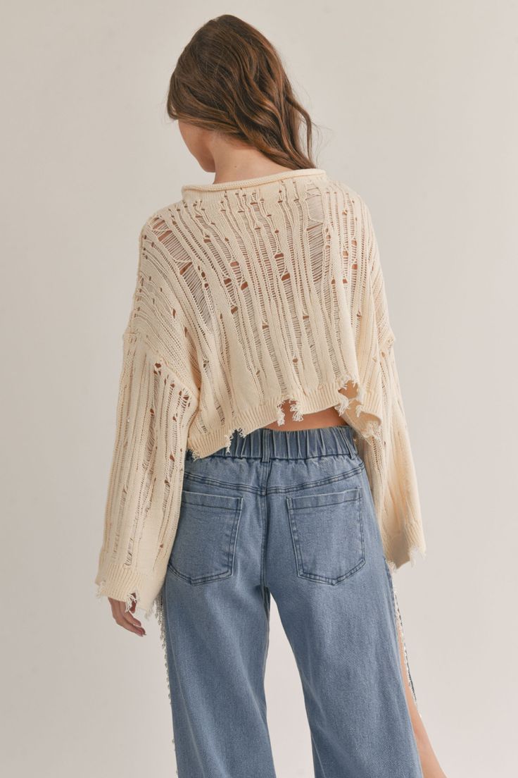 distressed sweater top, cream sweater, knit sweater, cropped sweater, fall sweater, fall fashion, fall outfit inspo, outfit inspo 2023, fall outfit, winter fashion, winter outfits, winter sweater, ootd, ootn, travel outfit, sweater, going out outfit, everyday outfit, date night outfit, online shopping, Christmas outfit, clothing brand, online clothing store, concert fashion, aesthetic fashion, holiday fashion, trendy fashion, pumpkin patch outfit, thanksgiving outfit, sweater weather #fallfashio Distressed Long Sleeve Sweater For Spring, Casual Ripped Sweater For Fall, Hole Sweater Outfit, Casual Cropped Pointelle Knit Sweater, Casual Cropped Sweater In Pointelle Knit, Casual Spring Sweater With Frayed Hem, Casual Sweater With Frayed Hem For Spring, Thanksgiving Outfit Sweater, Outfit Inspo 2023