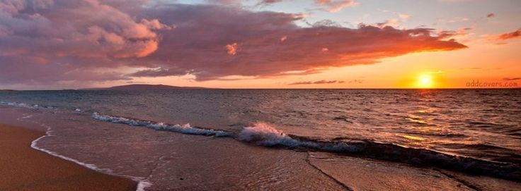 the sun is setting over the ocean with waves crashing on the beach and clouds in the sky