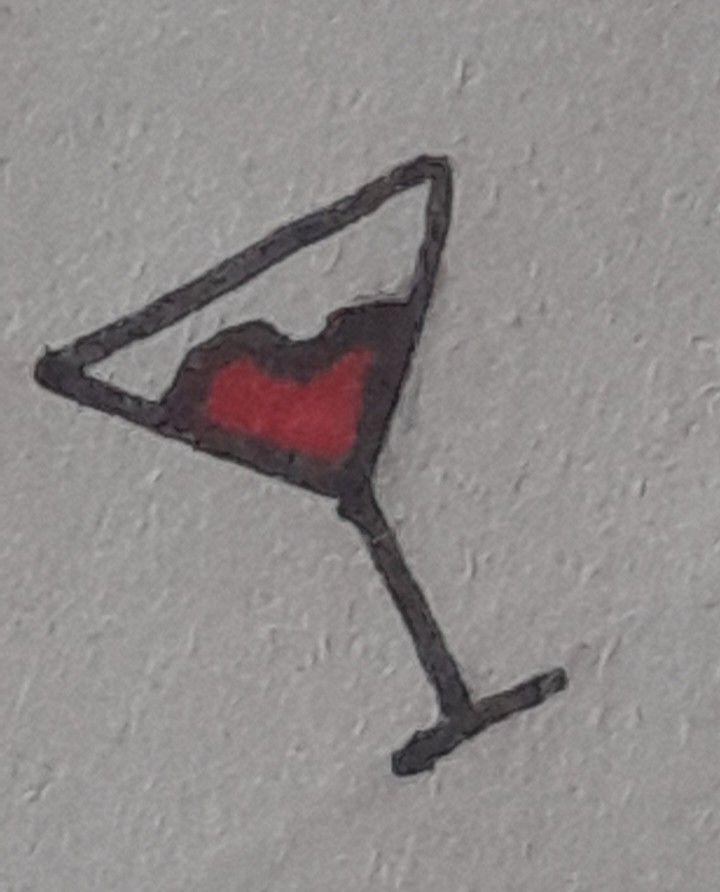 a drawing of a martini glass with a red heart on it