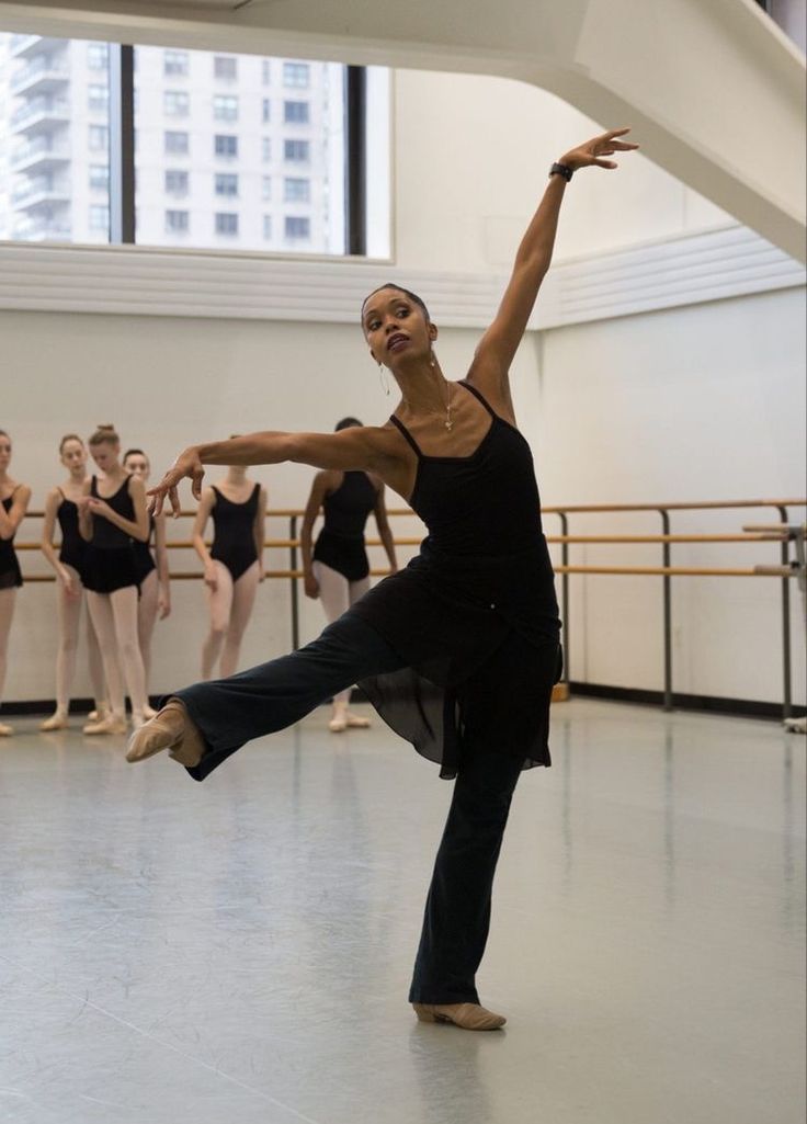 a group of ballerinas in a dance studio