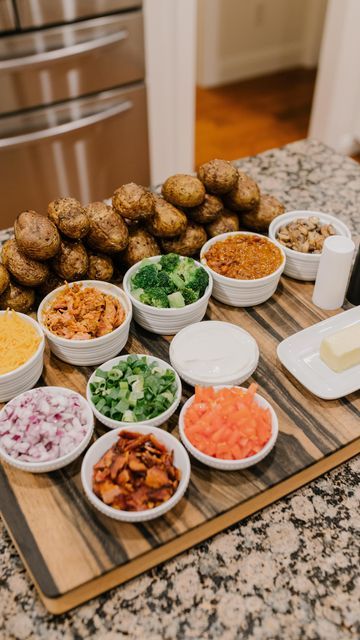 the food is prepared and ready to be eaten on the kitchen counter for dinner guests