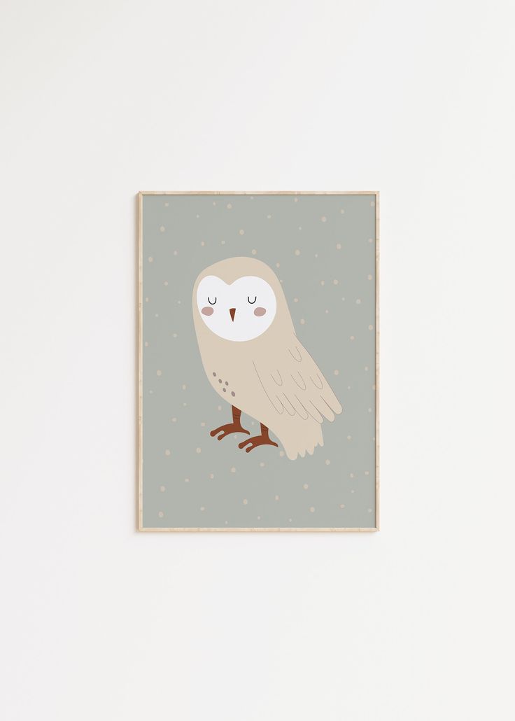 a white owl sitting on top of a wooden frame in front of a gray wall