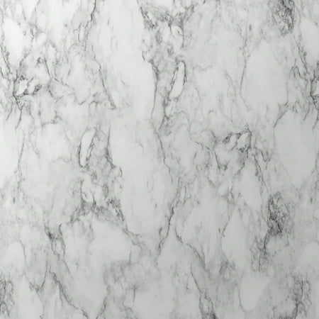 the marble is white and grey with black spots