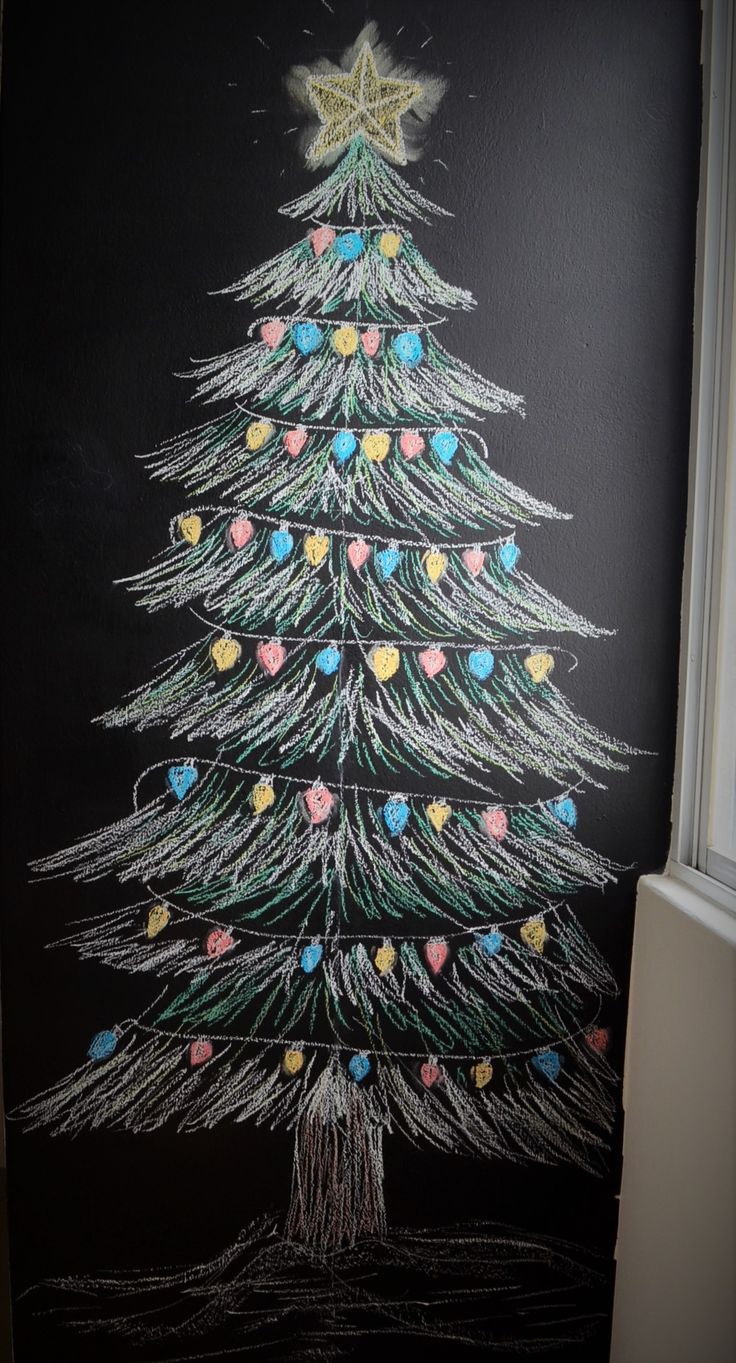 a chalk drawing of a decorated christmas tree