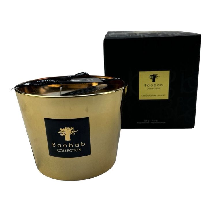 an image of a candle that is in front of a box with the label baobab collection