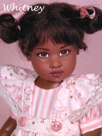 a close up of a doll wearing a dress