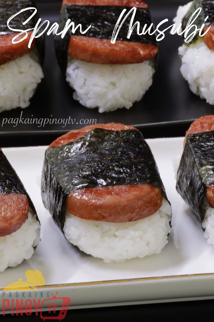 some sushi is sitting on a plate with white rice and black sauce in it