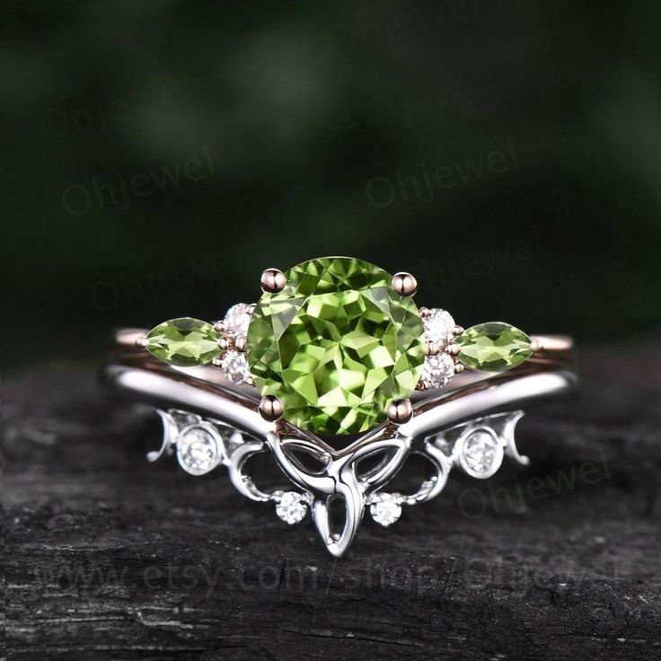 "This is a natural peridot engagement ring in solid gold,about 7mm 1.3ct round cut.  The accent stones are round moissanites and marquise cut 2x4mm peridot. The matching band stones are round  moissanites. The band width about 1.3-1.4mm. It can be made in any ring size. However please contact me to custom make it to a special big or small size. It can be made in white gold,rose gold or yellow gold with 14k or 18k. However for some people who are nickel allergic,I can also make it to 925 sterling silver to make you can wear it. The ring is handmade,very high quality! 30 days money back guarantee. Returns & Warranty 30-Day money back guarantee (starting from the day of delivery). \"Made to Order\" purchases qualify for our 30-day money back guarantee. The 30-day money back guarantee gives yo Victorian Peridot Ring, Elegant Peridot Diamond Ring With Prong Setting, Stackable Peridot Wedding Jewelry, Fine Jewelry Peridot Diamond Wedding Ring, Fine Jewelry Peridot Diamond Ring For Wedding, Elegant Peridot Promise Ring, Elegant Peridot Round Cut Diamond Ring, Elegant Round Cut Peridot Diamond Ring, Elegant Peridot Ring Jewelry