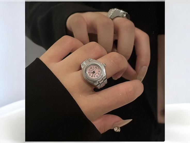 ⌚✨ Mini Watch Ring - Where Time Meets Style! ✨⌚ This charming ring combines the elegance of a classic timepiece with the allure of unique, handmade jewelry. Crafted with meticulous attention to detail, our Mini Watch Ring features a vintage-inspired design that will make you stand out. Perfect for watch enthusiasts and those who appreciate a touch of steampunk flair! 🌟 Features: Adjustable band for a perfect fit Intricate watch face detail Vintage, steampunk aesthetic Handmade with love and pre Clock Ring, Steampunk Aesthetic, Watch Ring, Steampunk Rings, Vintage Steampunk, Ring Watch, Unique Handmade Jewelry, Vintage Inspired Design, Ring Unique