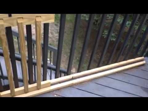 an image of a balcony railing made out of wood