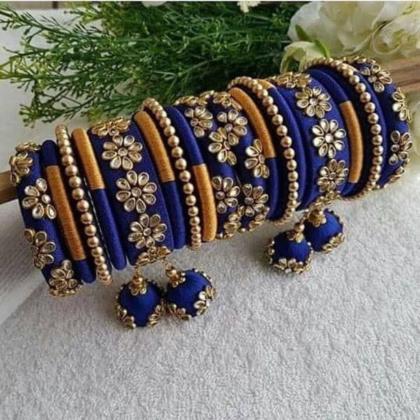 "Traditional Handmade Silk Thread Kundan Stone Studded Bangle Chuda Set Fashion Jewelry For Women Wedding Festive Party Wear Kada Set BANGLE SIZE -  2.4\" Inches, 2.6\" Inches, 2.8\" Inches, 2.10\" Inches Weight - 125 gm  Material: Silk Thread Color: As Per Picture The Bangles are decorated with beautiful stone. It makes your look noble and adds your charming Package include Set Of Silk Thread Bangles Fantastic Hand Kada for weddings, proms, parties or other special occasions * Specially Made For Traditional Occasions. * Used For Hands, It Can Be Reused. * For Bridal bridesmaids." Party Bangle With Gota Work, Multicolor Dori Work Bangle For Wedding, Dori Work Bangle Jewelry For Wedding, Festive Dori Work Bangle For Festivals, Dori Work Bangle For Wedding And Diwali, Wedding Bangle With Dori Work For Diwali, Traditional Blue Bangle For Weddings, Bollywood Wedding Bangle With Dori Work, Wedding Bangle With Dori Work For Festivals