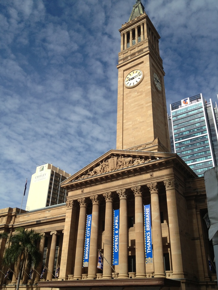 a tall building with a clock tower on top