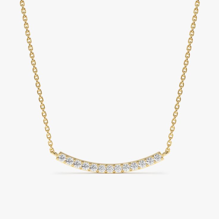 Ava A little curve on the classic diamond bar pendant! This elegant necklace features a dainty curved bar pendant crafted from 18k yellow gold. The bar is pave-set with sparkling diamonds, creating a dazzling display of light. The necklace suspends from a dainty chain, making it perfect for everyday wear or for adding a touch of glamour to a special occasion. - Handmade- Solid Gold- Natural Diamonds - G Color, SI Quality Diamonds- Total Diamond Carat Weight: 0.04 ctw- Bar Dimensions: 1 x 14 mm A Small Diamond Necklace, Dainty Bar Necklace, Bar Dimensions, Diamond Bar Necklace, Chain Diamond, Chain Making, Curved Bar, Collar Chain, Diamond Choker