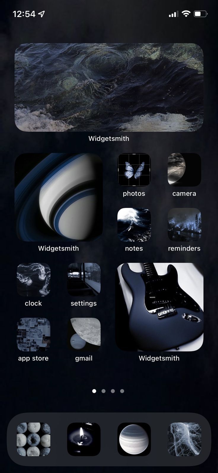 an iphone screen with various images and text on the bottom right corner, including black background