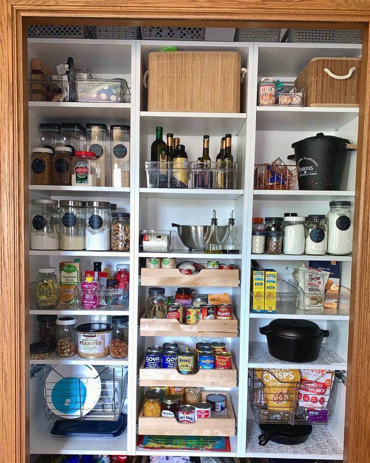 an organized pantry with lots of food and condiments