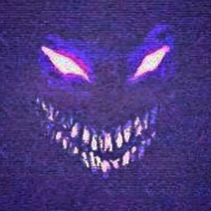 an evil looking face with glowing eyes