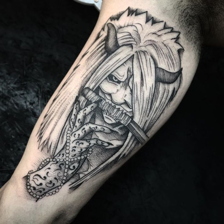 a person with a tattoo on their arm