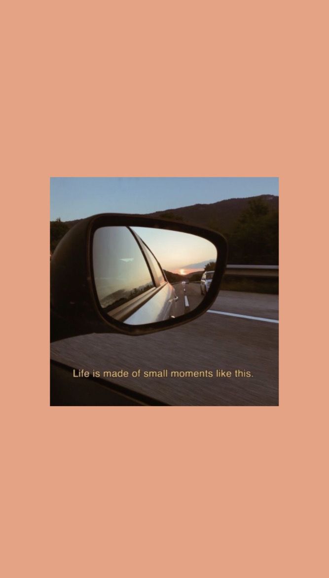 a car's side view mirror with the words life is made of small moments like this