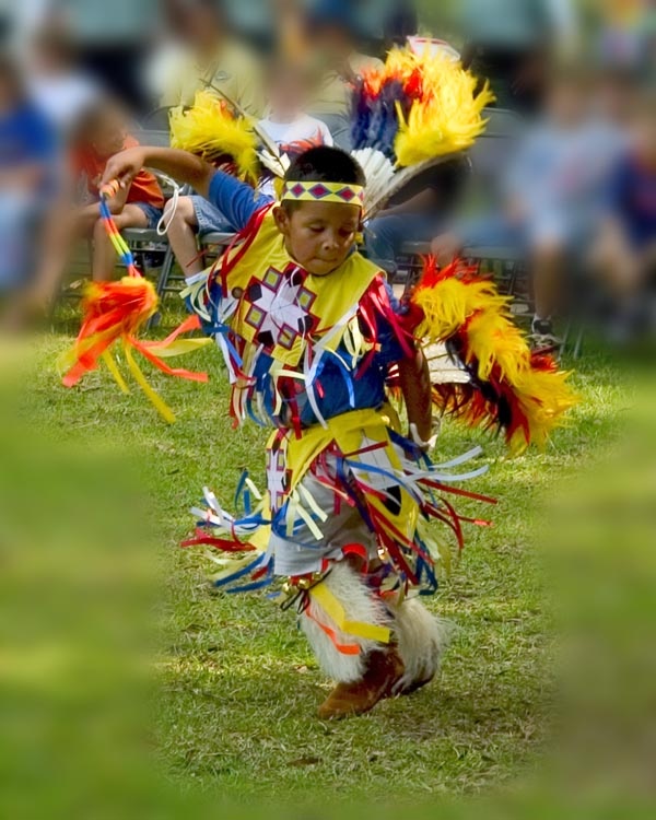 a little boy dressed in native american clothing dancing with words above him that says, there are short - cuts to happiness and dancing is one of them