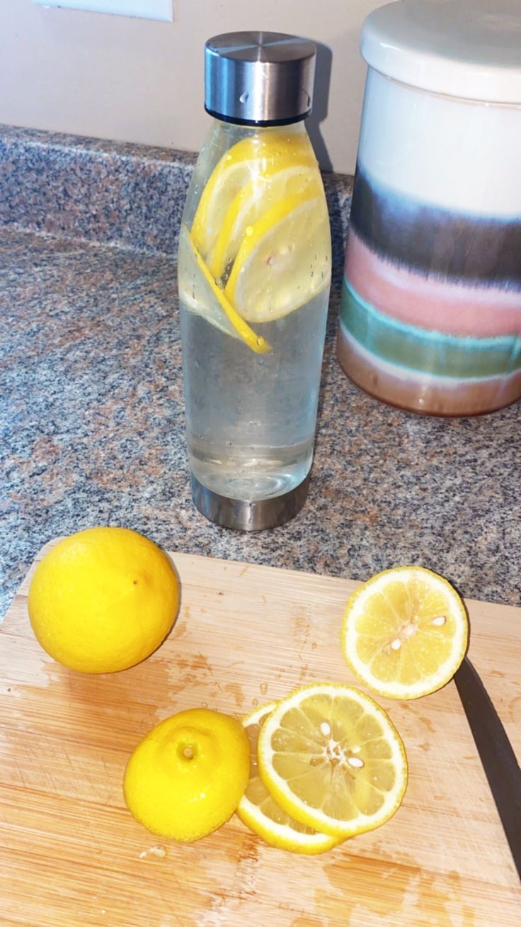 the lemons are cut up on the cutting board