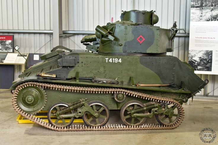 an old tank is on display in a museum