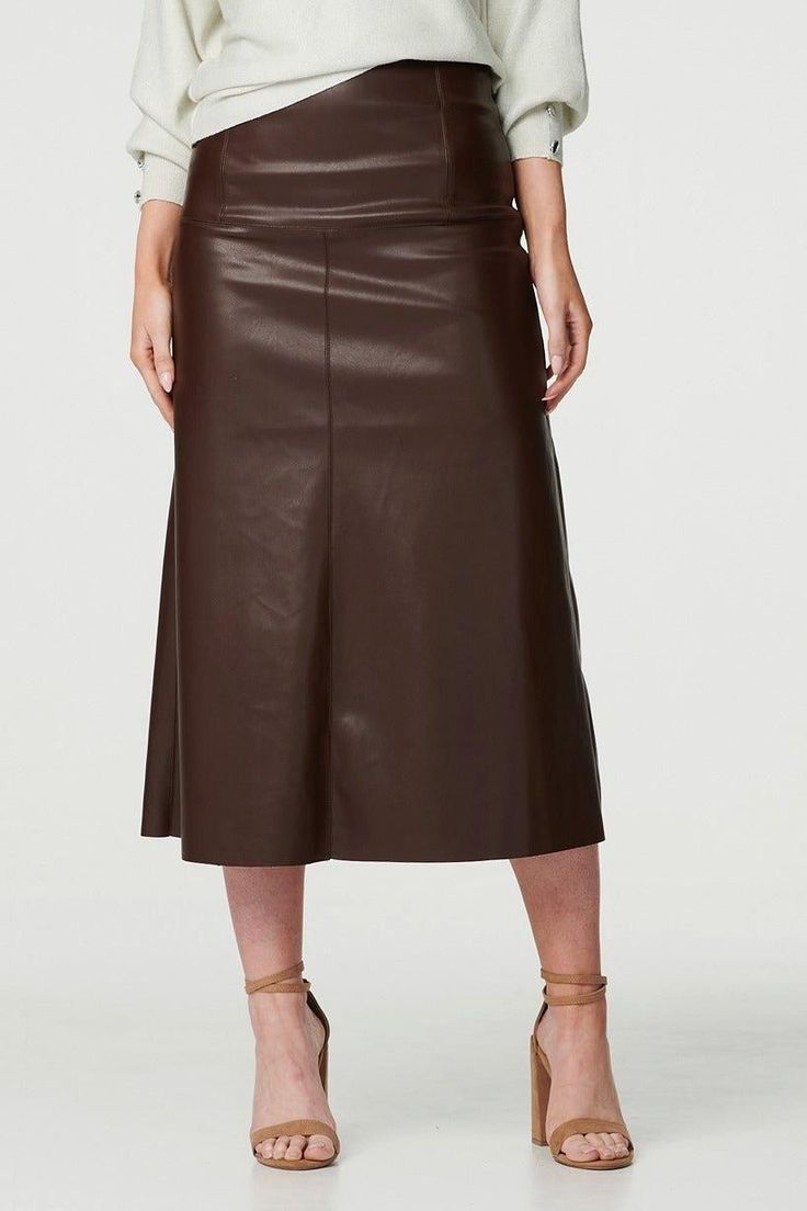 Add a trendy faux leather look to your skirt collection with this sleek midi. It has a high waist, fitted straight silhouette and a midi length hem. Pair with a tucked in blouse or long sleeve fitted top for a chic style you could wear for lunch out with friends or even a day at the office. Long Sleeve Fitted Top, Satin Outfits, Evening Trousers, Denim Wedding, High Waist Midi Skirt, Skirt Collection, Evening Skirts, Petite Jumpsuit, Sequin Outfit