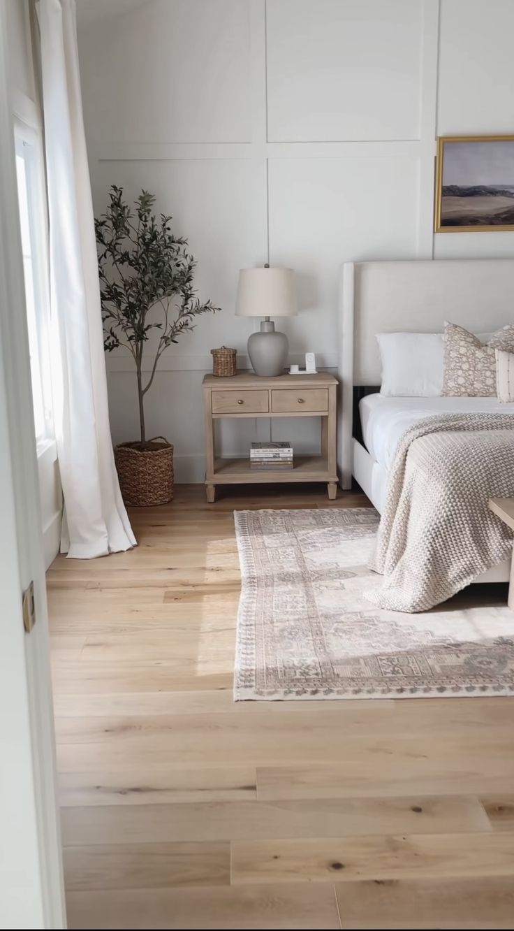 Rug On Light Wood Floor Master Bedrooms, Calm Airy Bedroom, Bedroom Inspo With Wooden Floor, Light Oak Floor Bedroom, Master Bedrooms Wooden Floor, Neutral Bedroom Flooring, Light Wooden Floor Bedroom Ideas, Wood Floor White Walls Bedroom, Neutral Bedroom Wooden Floor