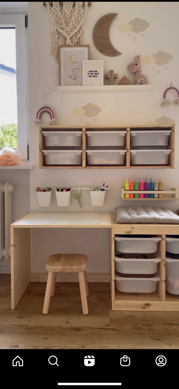 a child's play room with toys and storage