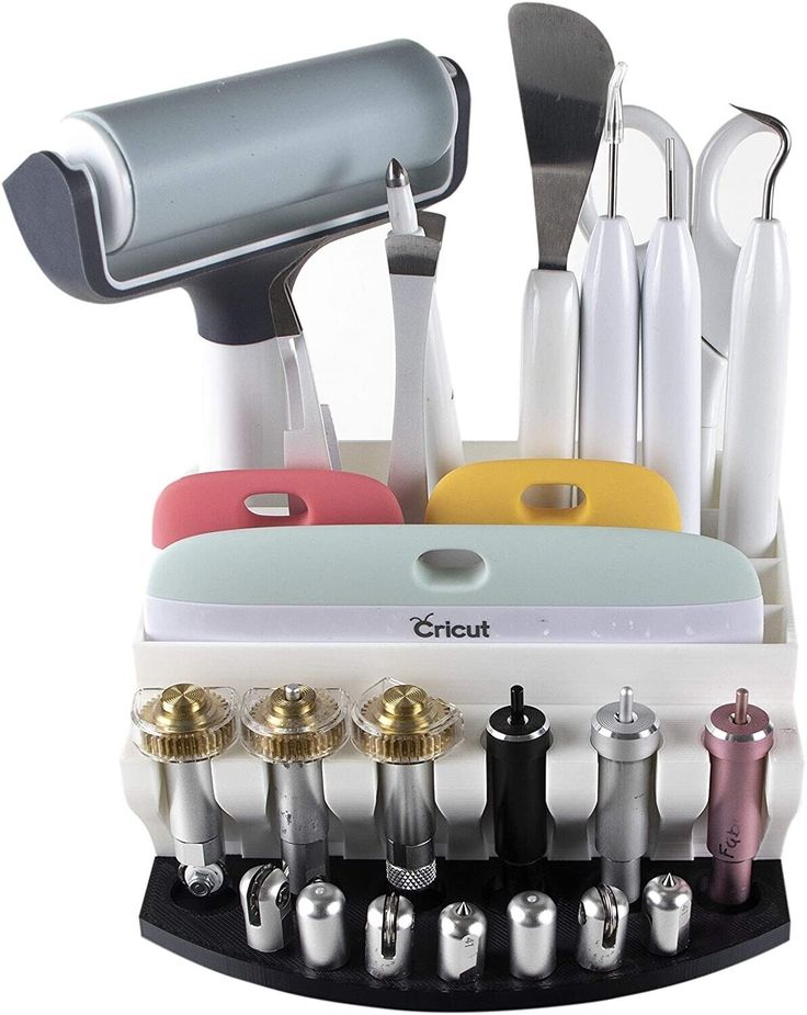 an assortment of kitchen utensils in a holder