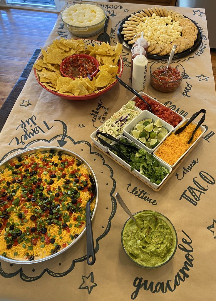 a table topped with lots of different types of food