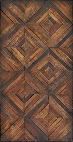 a wooden wall with many different shapes and sizes on it's sides, including the diagonal