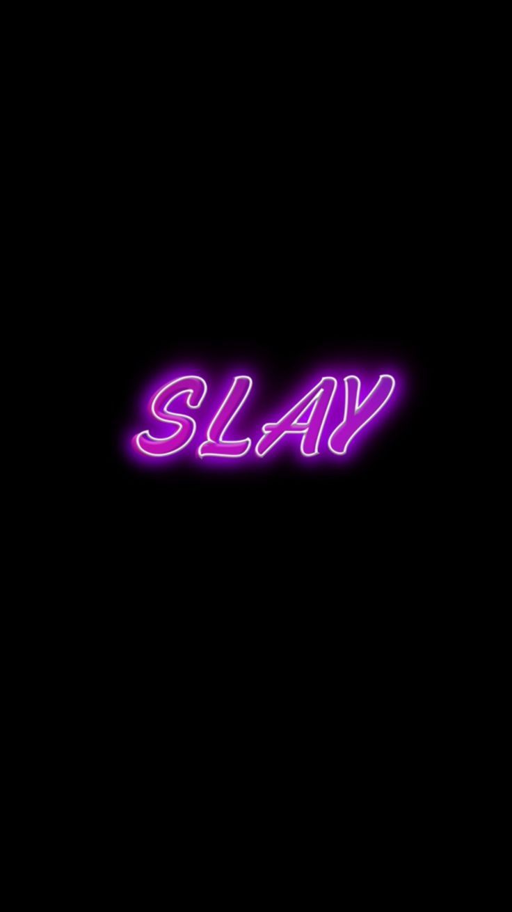 the word slay is lit up in purple