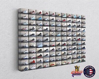 a wall mounted shoe rack with many pairs of shoes