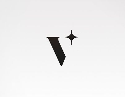 a black and white photo of the letter v