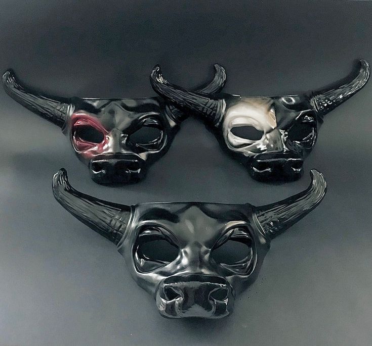 Experience the essence of strength and magnificence with our captivating bull mask adorned with striking bull horns. Step into the world of these majestic creatures, exuding their fearless spirit and commanding presence. This mask is the perfect addition to any masquerade outfit or Halloween costume! Age Group/Gender - Adult/Men Size/Type - One size fits all adults Mask Color - Black with colored eye Mask Material - Polyresin Black Horned Mask For Masquerade, Black Horned Masquerade Mask, Bull Mask, Masquerade Dance, Mardi Gras Kid, Kids Party Packs, Gold Masquerade Mask, Black Masquerade Mask, Masquerade Ball Party